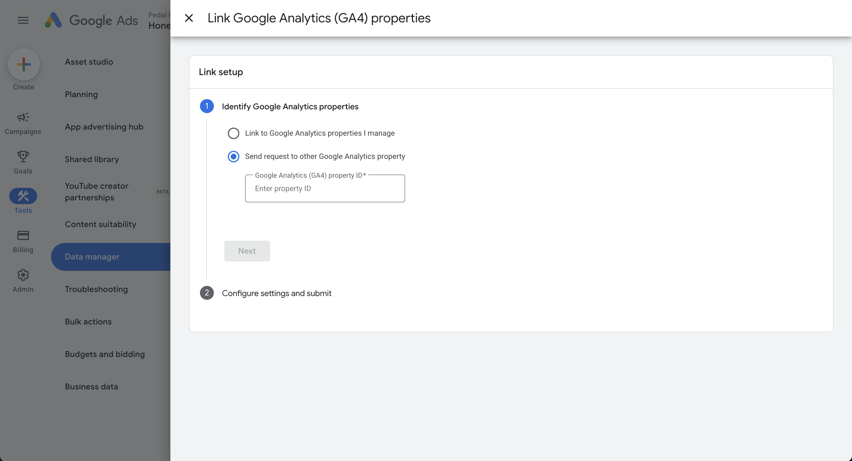 Google Ads "Link Google Analytics (GA4) properties" setup dialog, opened from Tools then Data manager, with options to link a GA4 property you manage or send a link request to another property by entering its GA4 property ID